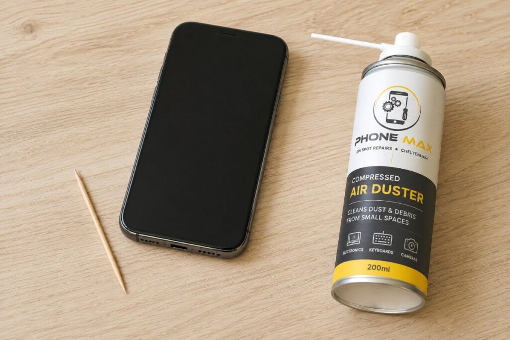 trying to clear charging port with a wooden toothpick or a can of compressed air